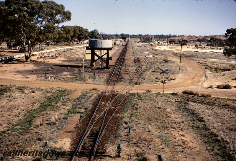 T05069
Station and yard, water pipeline, water tower with a  cylindrical Squatters tank, station shelter, sidings, road crossing, houses, Yellowdine, EGR line
