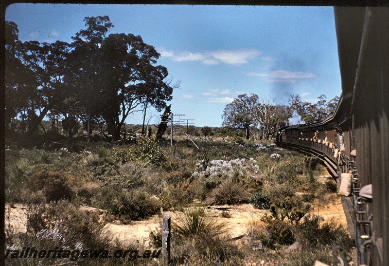T05070
MRWA C class 18, hauling RHS tour train to Mooliabeenee, water bags on carriages, MR line, view along the side of the train from rear carriage looking towards front
