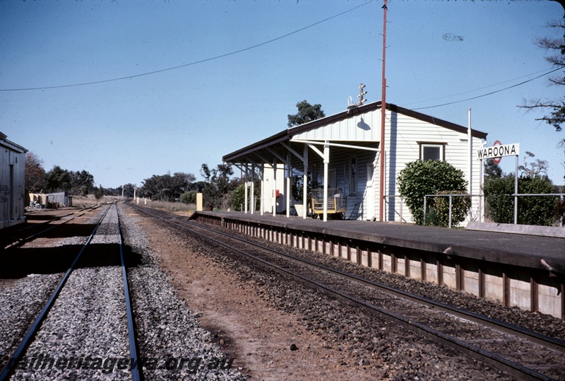 T05099
Station building, platform, baggage trolley, station nameboardboard, signals, Waroona, SWR line, view looking south
