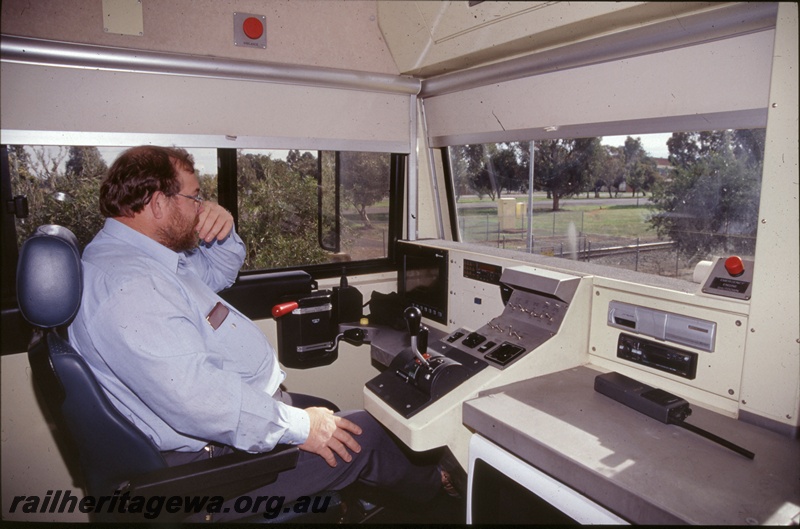 T05281
Internal view of an S Class 2111 diesel loco cab with the driver at the controls
