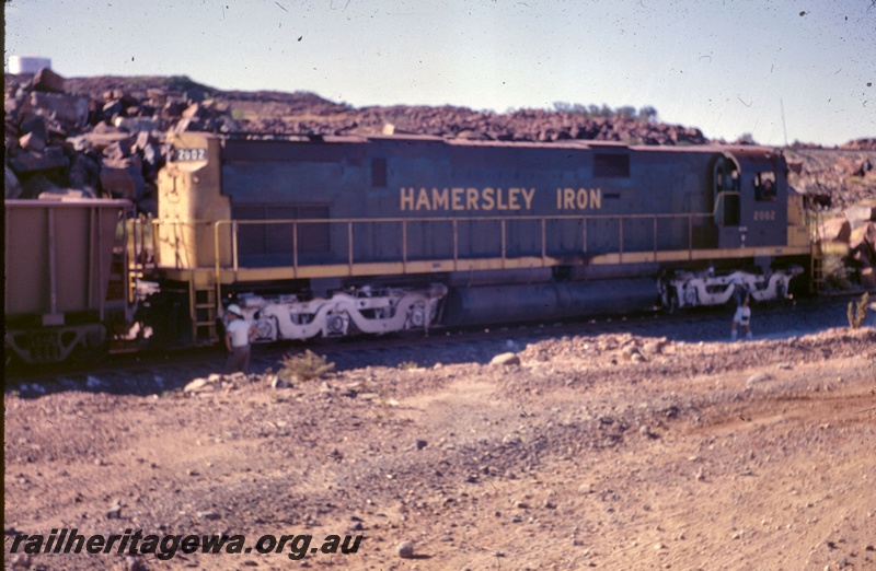 T05363
Hamersley Iron diesel loco No 2002, iron ore wagon (part only), Pilbara, end and side view
