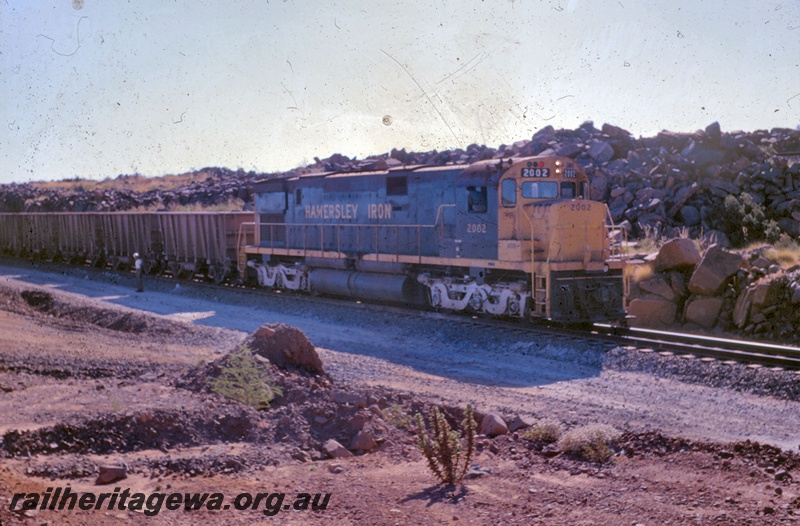 T05365
Hamersley Iron loco 2002, on iron ore train, Pilbara, side and front view
