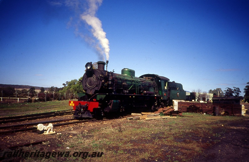 T05414
W class 933, coaling up, point lever, points, track, sleepers, trackside buildings, front and side view from track level, Pichi Richi Railway, South Australia
