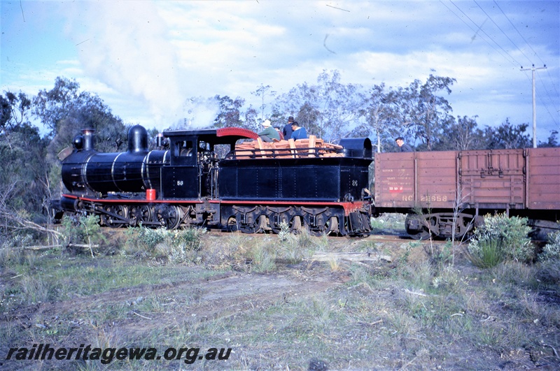 T05578
Donnelly Sawmills  Yx class 86 approaches Yornup from Donnelly River mill. Side view of locomotive and wagon. 
