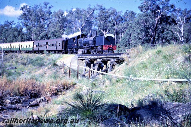 T05609
Msa class 499 ARHS tour to Dwellingup  crossing wooden bridge near Bergining. PN line.
