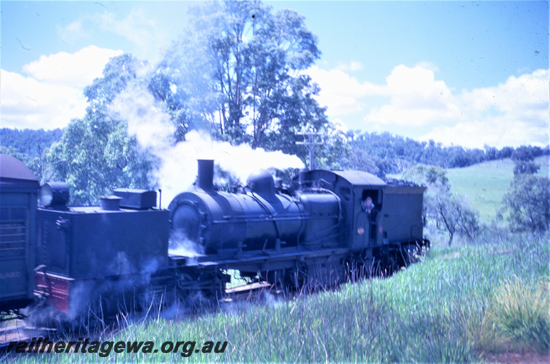 T05624
Msa class 499 hauling ARHS tour train to Dwellingup  near Bergining.  Rear view of locomotive. PN line.
