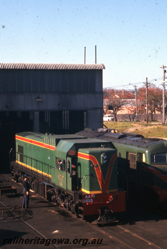 T05657
2 of 3 views of AA class 1515 as new, East Perth Loco Depot, in the forecourt of the diesel shed, elevated side and front view 
