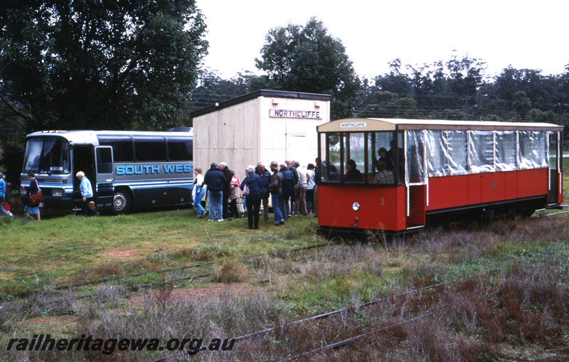 T05689
Pemberton tram car at Northcliffe Station and South West Coach Lines bus in background. PP line.
