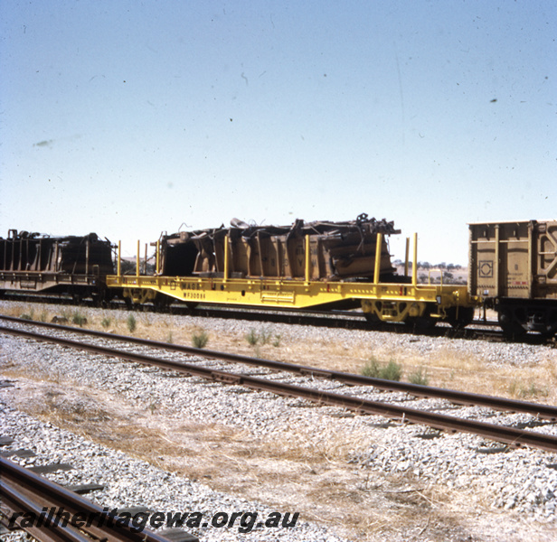 T05731
WF class 30084 standard gauge flat wagon. Loaded with damaged WO class iron ore wagon.
