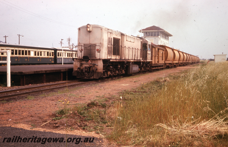 T05739
R class 1905 (pink livery) passing through Brunswick Junction station hauling a  mineral sands train from Capel. SWR line. 
