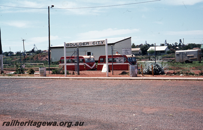 T05755
Boulder Loopline Railway  - two Wickham railcars at Boulder City Station, station nameboard in photo.  B line.
