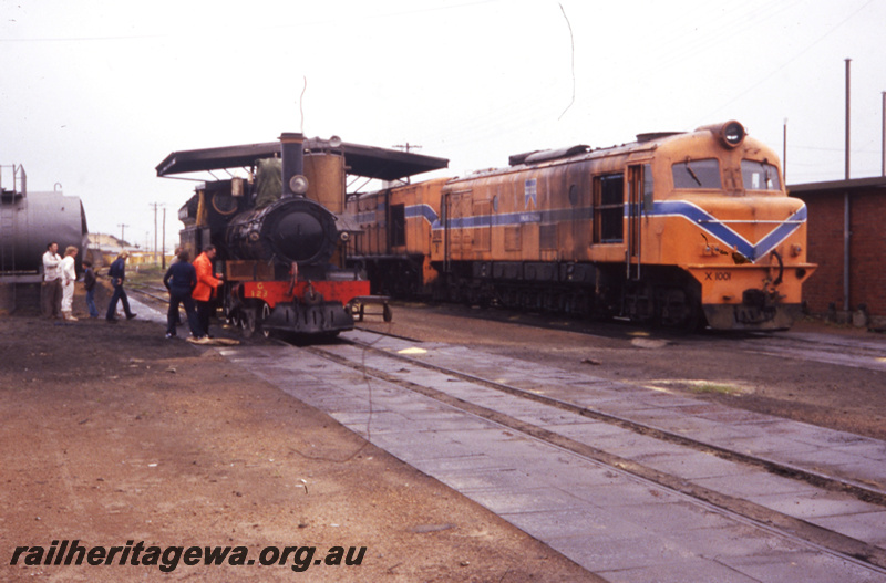 T05756
X class 1001 (orange livery) , G class 123 at Bunbury loco depot. SWR line.
