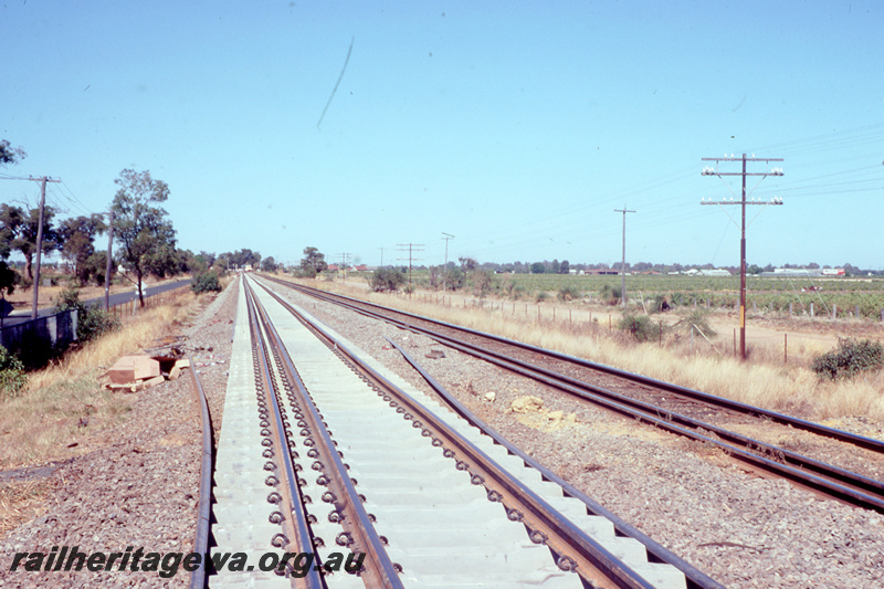 T05788
8 of 8 views of the work on the Kalgoorlie to Kwinana Rehabilitation Project featuring the P811 Track Replacement Machine. View of the completed track replacement
