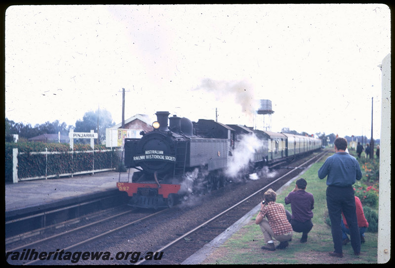 T06180
DM Class 587 and DD Class 592, ARHS tour train to Coolup, Pinjarra Station, station nameboard, platform, water tower, photographers, SWR line
