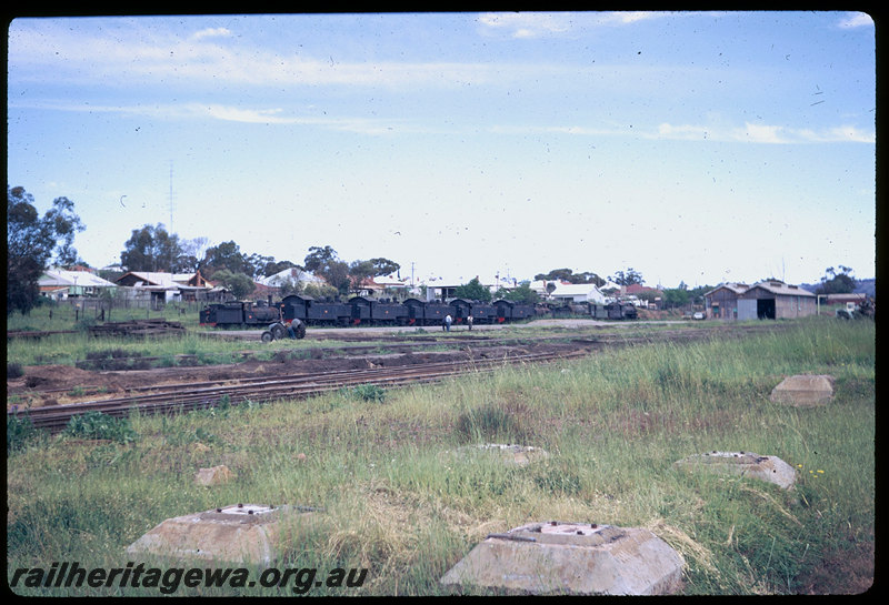 T06311
Northam station yard, steam locomotives stored awaiting scrapping, G Class 117, DD Class 591 DD Class 600, DD Claass 593 DDClass 598, O Class 208, PR Class 522, PR Class 521, goods shed, water tank foundations
