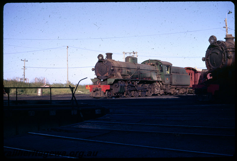 T06386
W Class 945, V Class 1212 equiped with a Capuchon chimney, Bunbury loco depot, turntable
