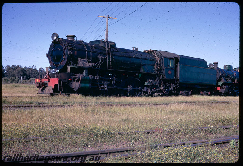 T06389
V Class 1219 stored at Collie loco depot, unidentified W Class
