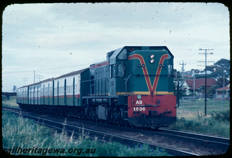 T06780
AB Class 1536, Up suburban passenger service, approaching Cottesloe, Eric Street bridge in background, ER line
