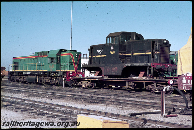 T06865
AB Class 1531, ex-NSWGR 79 Class 7920 loaded on QCE Class 23594 flat wagon in consist, Forrestfield, 79 Class bound for Geraldton to be shipped to British Phosphate Commissioners on Christmas Island, ground shunt signal, vacuum brake test stand
