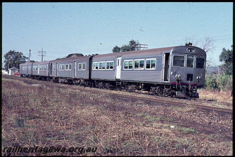 T06903
ADB Class 772 leading ADK/ADB/ADK Class railcar set, Down suburban passenger service, departing Stokely, Albany Highway level crossing, SWR line
