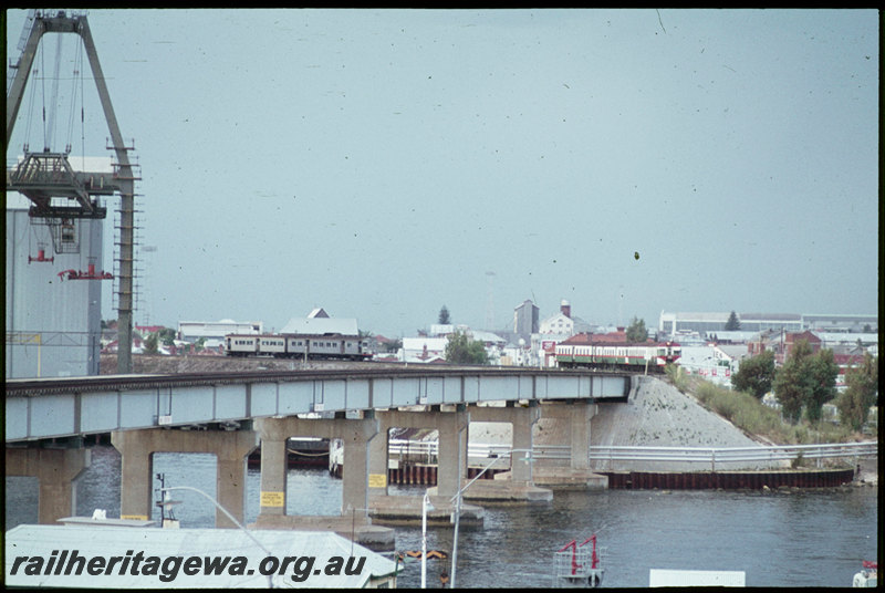 T07094
ADK/ADB Class railcar set, Down suburban passenger service, ADG/ADA/ADG/ADA Class railcar set, Up suburban passenger service, Swan River Bridge, Fremantle, ER line
