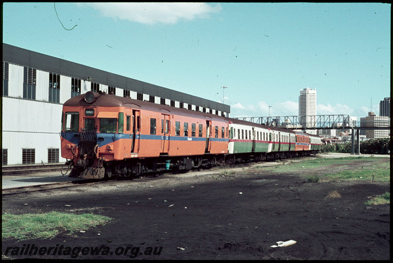 T07148
ADX Class 663, first iteration of Westrail livery, without white stripe, with ADA/ADX/ADA/ADX railcar set, Claisebrook Depot, footbridge, running shed
