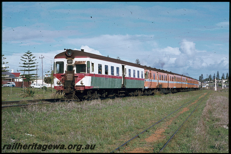 T07418
ADA/ADG/ADA/ADG/ADA/ADG Class railcar set, Down suburban passenger service, Cottesloe, semaphore signals, spur to Thomas Flour Mill in foreground, ER line
