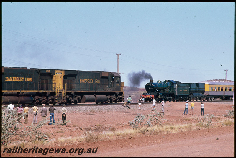 T07490
Hamersley Iron ALCos M636 4039 and 4047, iron ore train, crossing ex-Great Western Railway No. 4079 