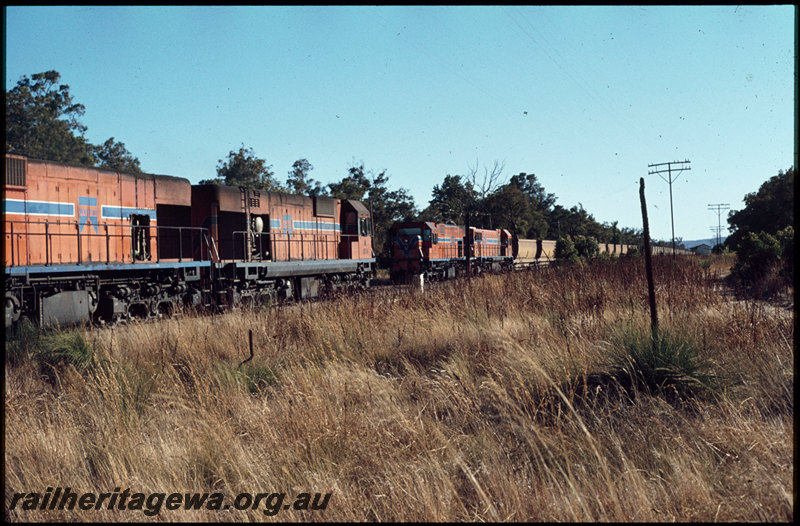 T07557
N Class 1882 with an unidentified N Class, Up loaded bauxite train, crossing N Class 1877 and DA Class 1565, Down empty bauxite train, XG Class coal wagons in consist, Mundijong, SWR line
