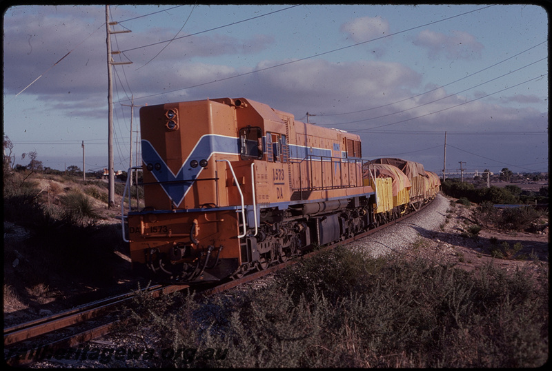 T07608
DA Class 1573, goods train departing Kwinana about to pass under Rockingham Road overpass

