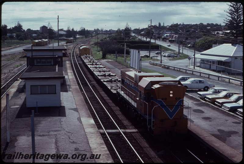 T07627
A Class 1514, Up goods train, Cottesloe, pipe carrying fixtures on WF Class wagons, signal cabin, semaphore signals, searchlight signal, point rodding, ER line
