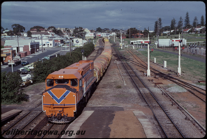T07628
DB Class 1582, Down goods train, Cottesloe, semaphore signals, searchlight signals, point rodding, Jarrad Street level crossing, ER line

