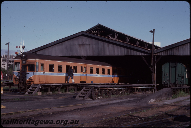T07636
ADA Class 766, Perth carriage shed, cleaner walking along platform, rear of ARA Class 351, semaphore signal, ER line
