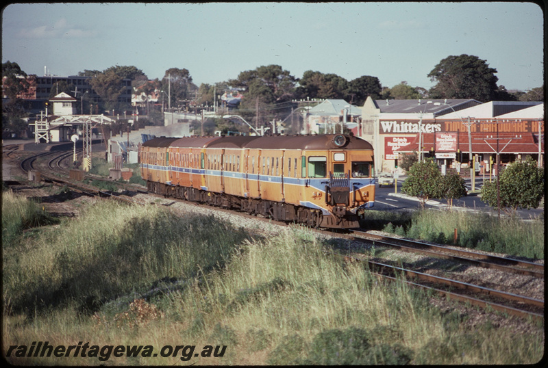 T07819
ADG/ADA/ADG/ADG Class railcar set, Up suburban passenger service, between Subiaco and Daglish, searchlight signals, footbridge, signal cabin, ER line
