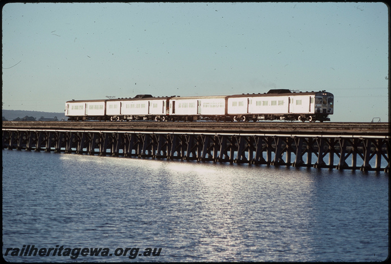 T07936
ADK/ADB/ADK/ADB Class railcar set, Up suburban passenger service, crossing Bunbury Bridge, timber trestle, SWR line
