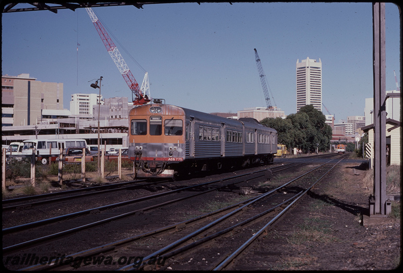 T08186
ADB Class 775 with ADK Class railcar, Down suburban passenger service, between City and Claisebrook, Lord Street level crossing, ER line
