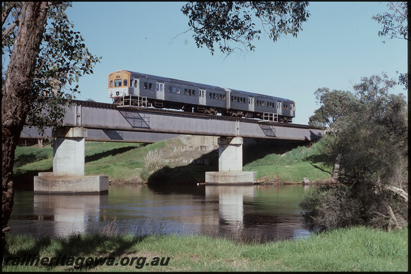 T08243
ADC/ADL Class railcar set, Down suburban passenger service, Swan River Bridge, concrete pylons, steel girder, Guildford, ER line
