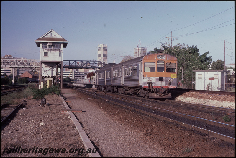T08262
ADB Class 775 with ADK Class railcar, Down suburban passenger service, departing Claisebrook, stopping pattern sign says 