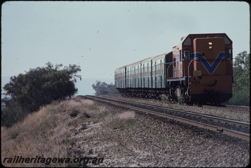 T08302
A Class 1511, Up suburban passenger service, Perth side of Kenwick Flyover, between Kenwick and Beckenham, stopping pattern sign says 