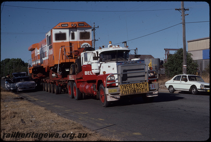 T08387
Mount Newman Mining GE C36-7M 5506 (rebuilt from ALCo C636 5455), on Bell Brothers low-bed trailer, leaving A Goninan & Co, Welshpool bound for the Pilbara
