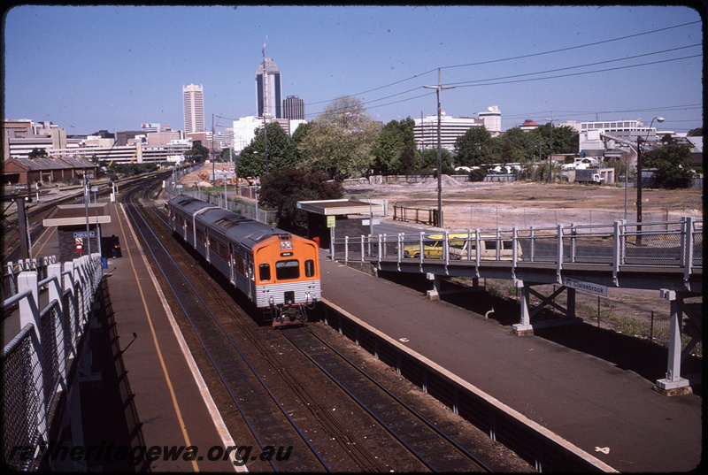 T08531
ADC/ADL Class railcar set, Down suburban passenger service, Claisebrook, platform, station shelters, footbridge, searchlight signals, station nameboard, ER line
