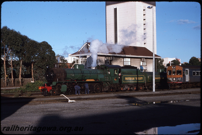 T08656
W Class 945, taking water, Hotham Valley Railway City Circle passenger special, Perth Yard, Perth Box B signal cabin, ADB Class 779, little david points lever, ER line
